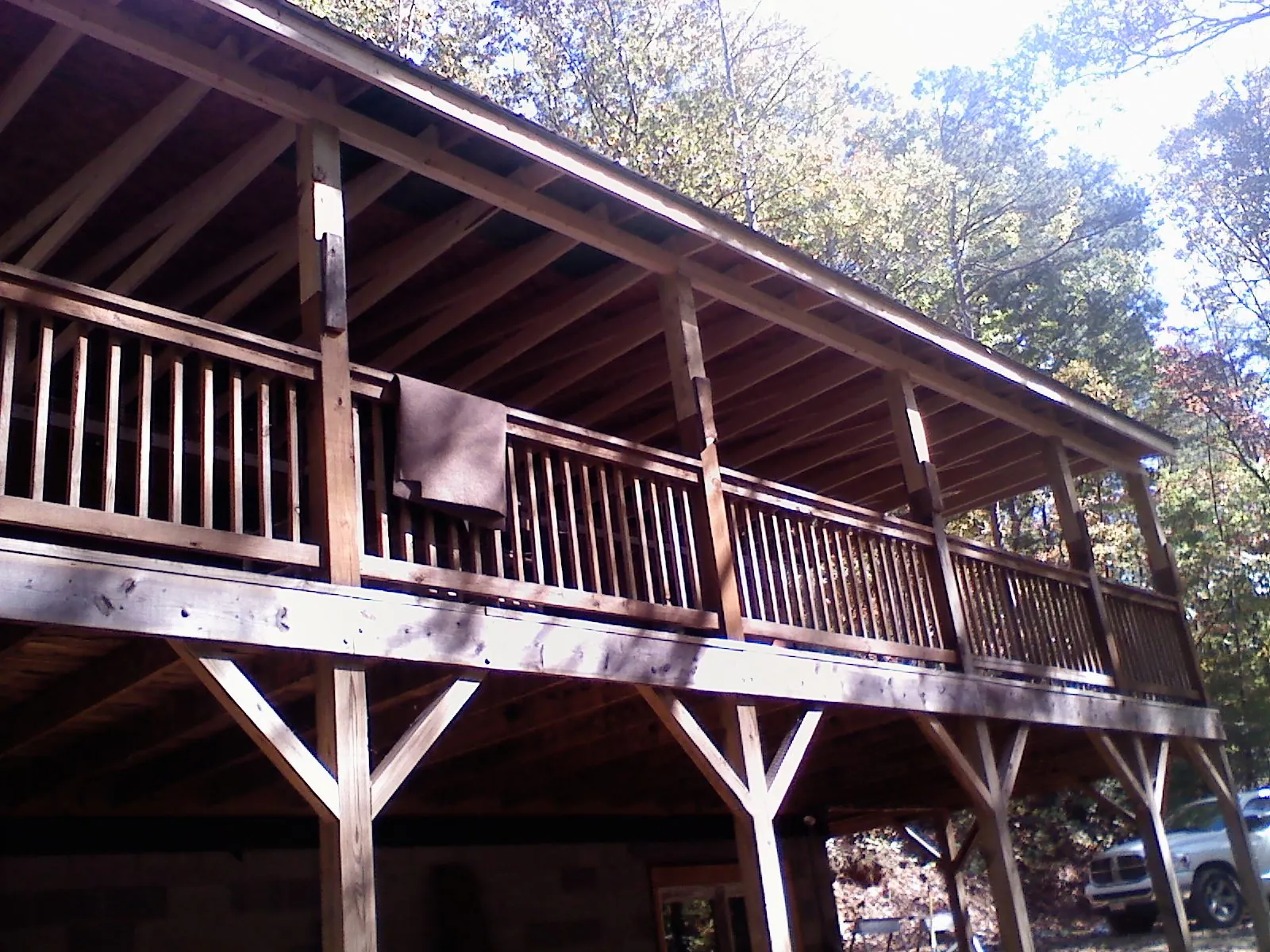 Timber framing under a new elevated porch and deck — Roof Leak Repair in Wetmore by Roofing Brothers